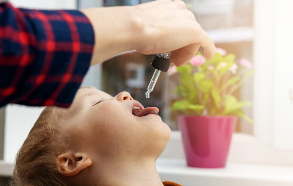 Low Dose Allergen Therapy Administration. Picture of a Dropper Under Tongue. 